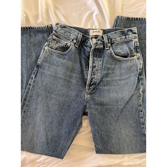 Medium wash straight legged AGOLDE jeans